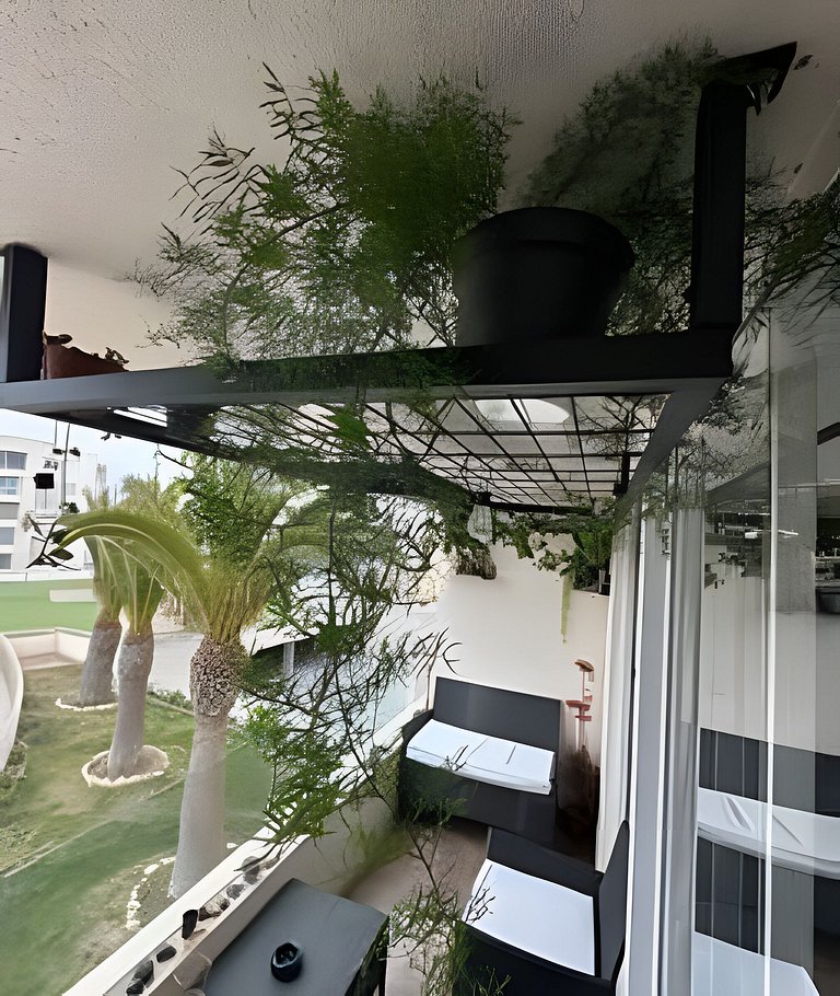 Jardines con vista al mar